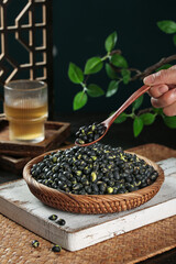 Black Beans in Wicker Basket with Wooden Spoon - Healthy Legume Food Photography