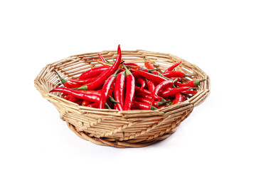 Fresh Red Chili Peppers in Wicker Basket Isolated on White Background