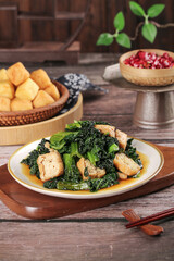 Stir-Fried Leafy Greens with Tofu Puffs - Asian Vegetarian Cooking