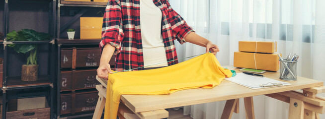 Banner Asian woman startup small business home office. Banner Online seller young asian woman use...