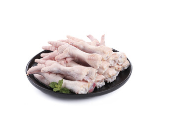 Fresh Raw Chicken Feet with Claws on Black Plate - Traditional Asian Cooking Ingredient