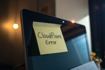 Sticky Note on Laptop Display Showing Cloudflare Error