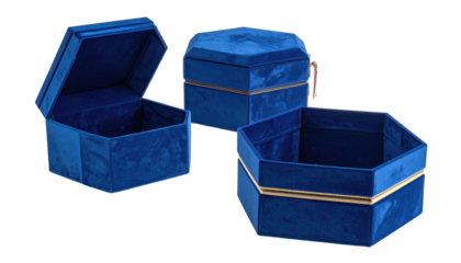 Three plush, blue, octagonal boxes with gold accents, varying lids. One open, one closed, one empty, set against black