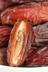 Fresh Dried Dates Fruit Close-up with Pit Visible - Golden Brown Natural Sweet Snack