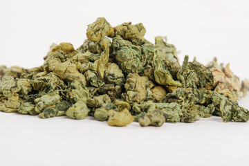 Dried Lotus Leaf Tea Granules - Scented Herbal Summer Beverage Ingredients on White Background