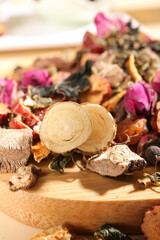 Traditional Herbal Tea Ingredients Variety with Dried Mushrooms and Rose Petals for Healthy Hot Drink Making