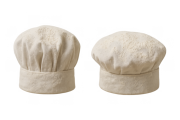 Two chef hats with flour, showing culinary arts, baking, and professional kitchen work, isolated on transparent background