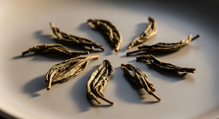 Close-up of Dried Tea Leaves on a Plate, Prepared for Brewing