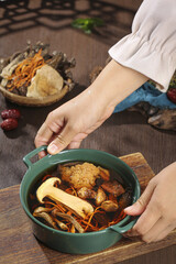 Traditional Mushroom Soup with Red Wolfberries and Dates - Colorful Asian Herbal Cooking with Mountain Ingredients