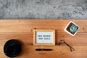 New Monday New Goals from Top View &mdash; Motivation and Fresh Start Concept