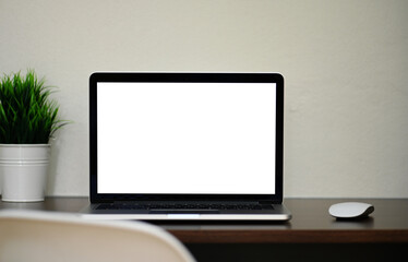 Vintage Workspace Laptop Mockup with Blank White Screen for Text or Product Display