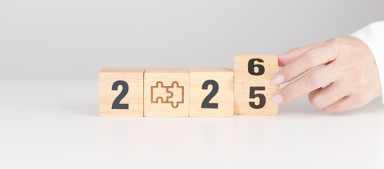 2025 year change to 2026 year block with jigsaw puzzle icon. Business Process, Team, teamwork,...