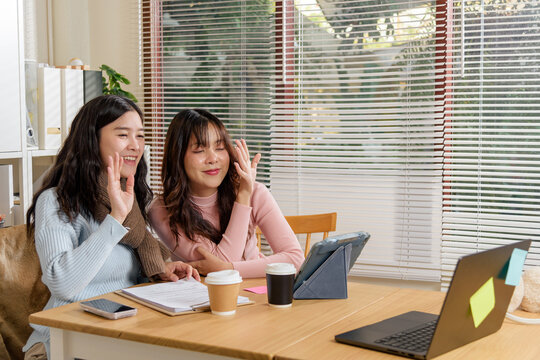 Busy people meet, young women work in office, financial business team consult, collaborating on important projects for successful outcomes, demonstrating dedicated effort and teamwork - Powered by Adobe