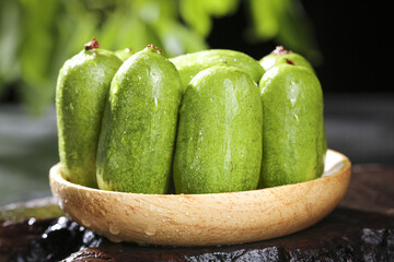 Fresh Kiwi Fruits in Wooden Bowl - Organic Healthy Food Rich in Vitamins