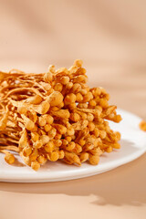 Golden Cordyceps Mushrooms Traditional Chinese Medicine Herbal Ingredient on White Plate