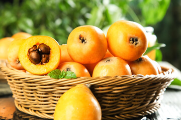 Fresh Loquat Fruits from Yunnan Mountains in Wicker Basket - Premium Quality Asian Stone Fruit Display