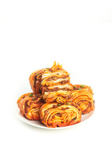 Handmade Savory Meat Rolls with Scallion Garnish on White Plate - Asian Pastry Food Photography