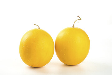 Fresh Golden Honeydew Melons on White Background