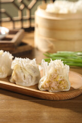Handmade Siu Mai Dumplings with Pure Mutton Filling Traditional Chinese Dim Sum on Wooden Board
