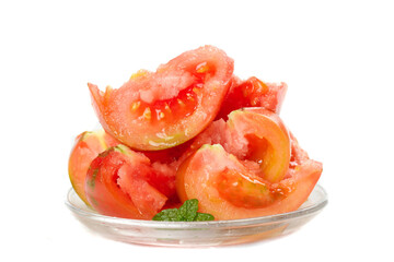Fresh Sliced Tomatoes with Water Drops on Glass Plate White Background
