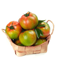 Fresh Ripe Tomatoes in Wicker Basket - Organic Heirloom Varieties with Water Droplets
