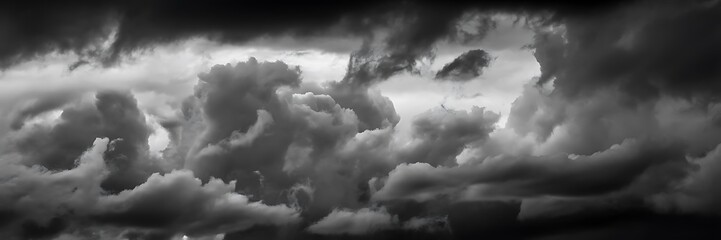 Fototapeta premium Dramatic panoramic view of dark storm clouds dark clouds