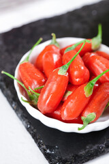 Fresh Red Goji Berries Wolfberries from Ningxia China in Bowl on Slate