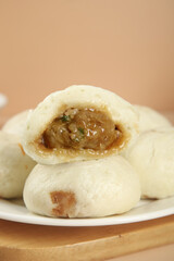 Handmade Steamed Pork Buns with Noodles and Scallion Traditional Asian Dumplings on White Plate