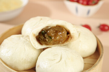 Handmade Steamed Pork Buns with Scallions in Traditional Bamboo Steamer - Asian Dim Sum Cuisine