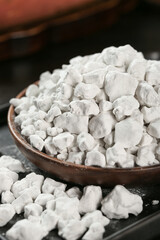 Raw Potato Starch Chunks in Wooden Bowl - Natural Food Ingredient for Cooking and Baking