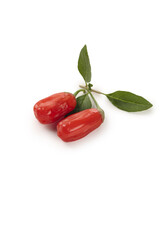 Fresh Red Goji Berries Ningxia Wolfberry with Leaves on White Background