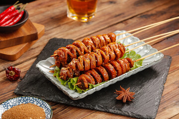 Traditional Shaanxi Spicy Gluten Skewers Ready to Share - Chinese Street Food on Wooden Table