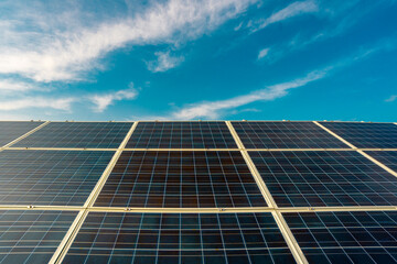 Obraz premium Panel installation on rooftops. Solar solutions for green living. Power from solar is renewable. Solar panel and sun energy. Solar fields generate clean energy.
