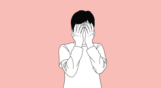 A person with black hair covers their face with both hands, conveying feelings of shame, shyness, or deep embarrassment against a simple pink background.