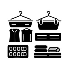 Laundry organization black glyph icon isolated on clothes storage