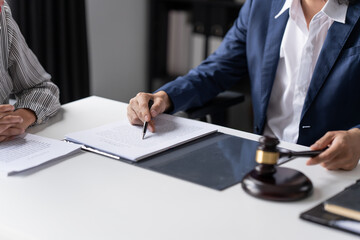 Lawyer businessman working with lawbook in office or courtroom Legal counsel with gavel and legal...