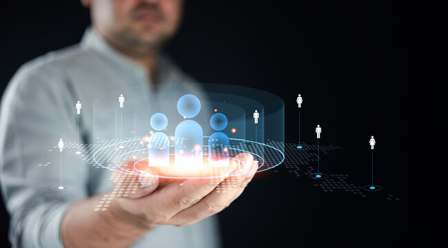 Businessman using digital interface to target customers. Marketing strategy, customer relationship management (CRM)