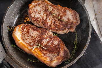 Beef stacks are pan-fried with rosemary and thyme. High quality photo