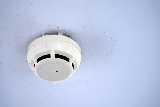 Close-Up of Smoke Detector on Ceiling