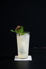 Vibrant Green Cocktail in Coupe Glass with Spiced Rim