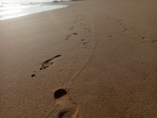 footprints on the beach