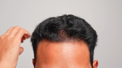 Sweeping five spread fingers across the scalp activates hair roots and refreshes the mind, symbolizing clarity, relaxation, circulation, focus, wellness, balance, and mindful self-care.
