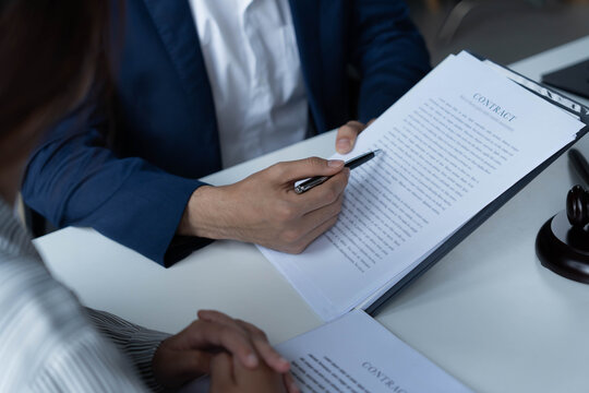 Lawyer give suggestions to client and signing contact