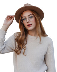 Young woman wearing glasses and a hat, styled for fashion and lifestyle photography. isolated on transparent background