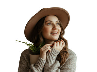 Young woman with hat and potted plant looking up with a smile, isolated isolated on transparent background