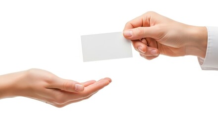 Close up of a hand in a white shirt sleeve offering a blank white business card to another open hand isolated on white background