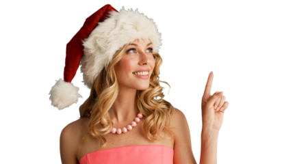 Festive woman in Santa hat joyfully points upward, radiating holiday cheer and seasonal goodwill