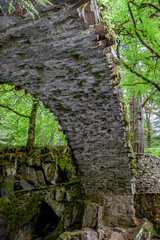 Stone archway over river, view from underneath