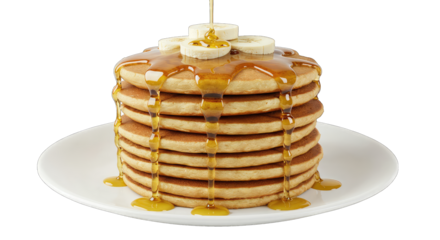 Golden pancakes stacked high with fresh banana slices and drizzled with warm syrup, a delightful breakfast treat.