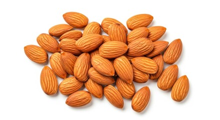 A pile of delicious whole almonds with their natural brown skin scattered on a clean white background isolated on white background